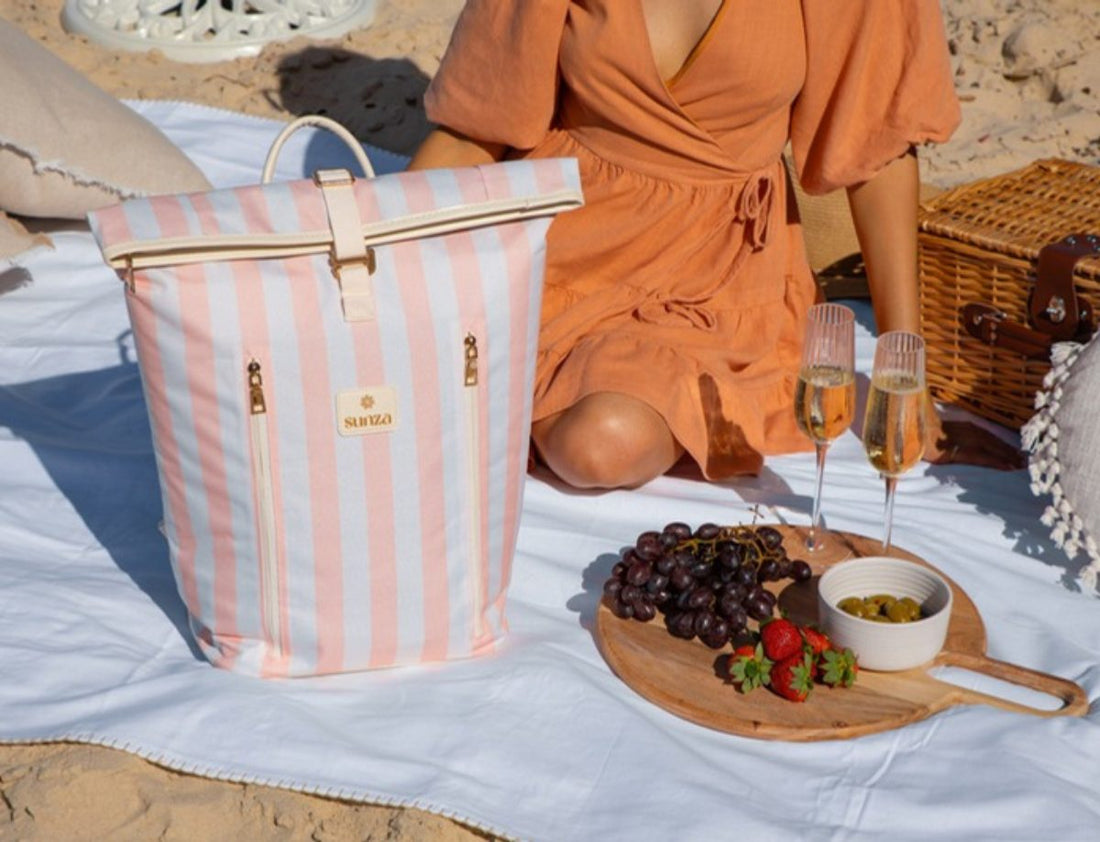 Insulated cooler bag keeping drinks cold at an outdoor picnic